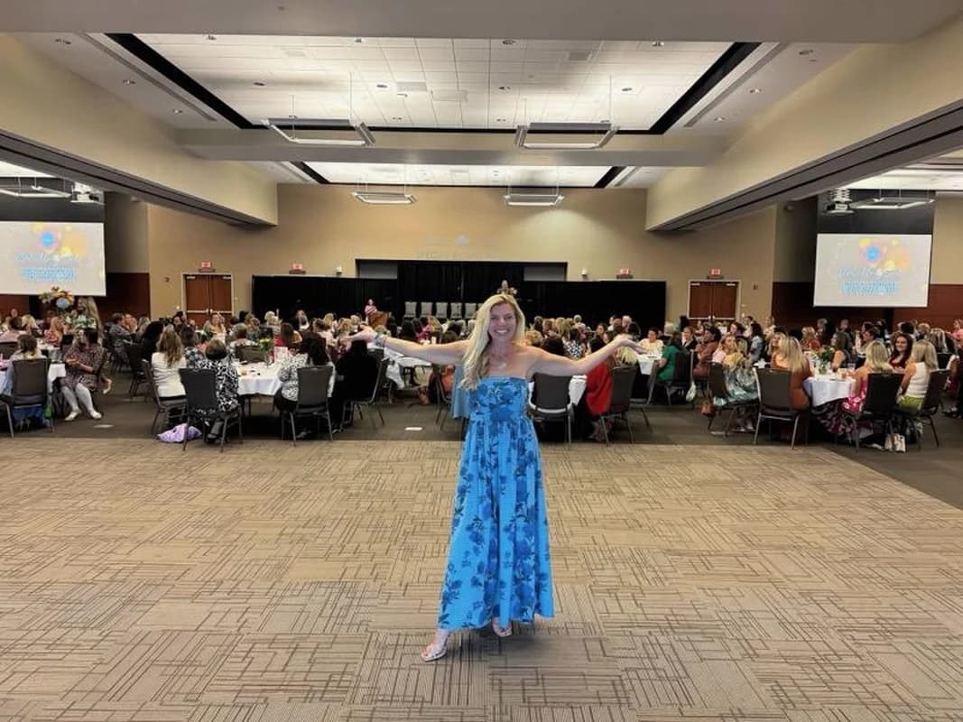 Molly Grantham welcoming a packed ballroom